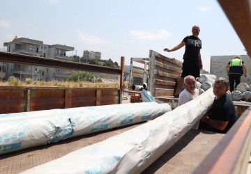Antalya’dan Yangınzedelere Destek: Çiftçilere Sera Naylonu Yardımı