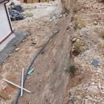 ADIYAMAN (PERRE) - (Şeriban ÖZÇAKMAK) - Adıyaman merkeze bağlı Çemberlitaş köyünde 6 Şubat depremlerinin ardından inşa edilen afet köy evlerinde altyapı, çevre düzenlemesi ve bazı yapısal eksikliklerin bulunduğu öne sürü...